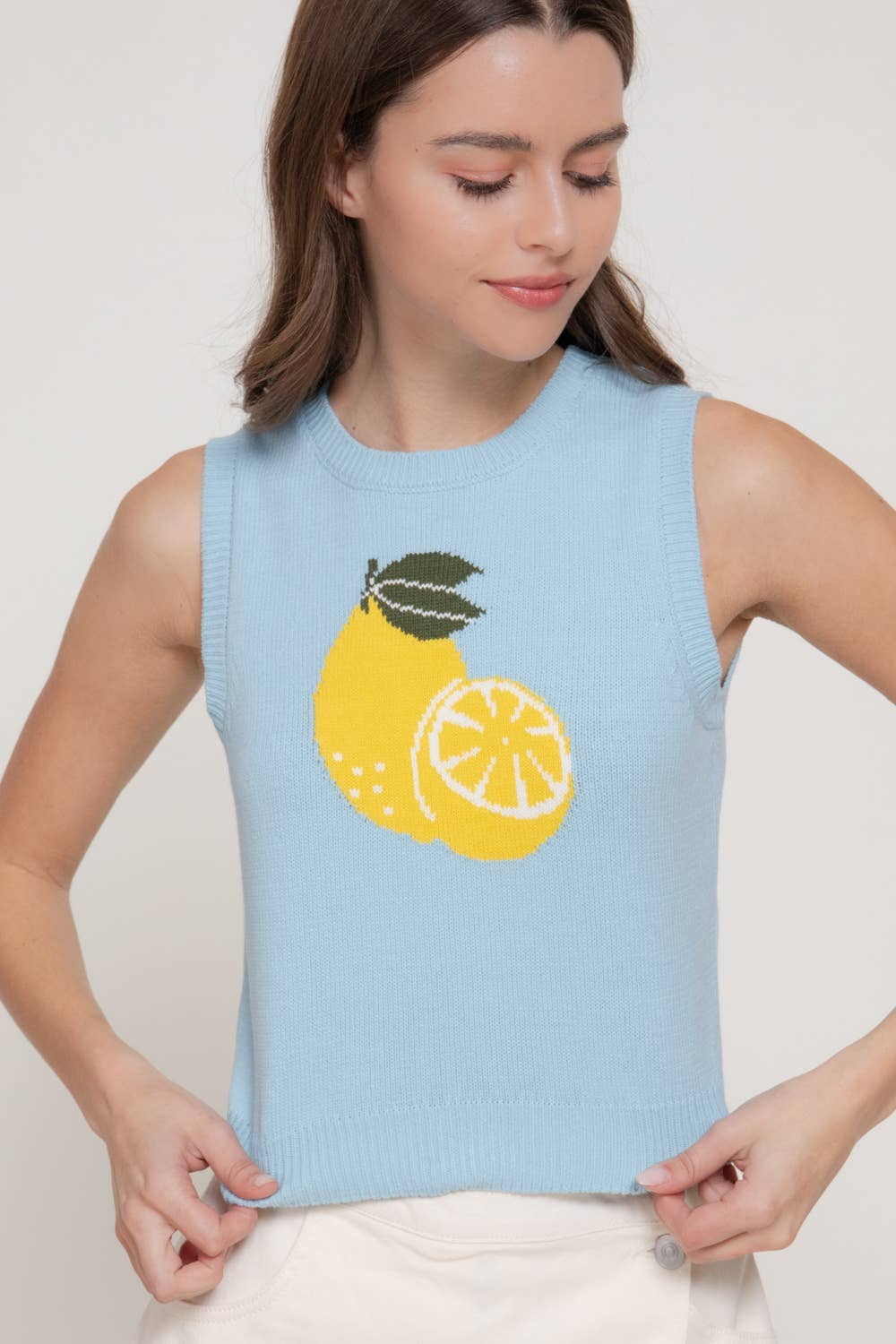 Top sin mangas de punto jacquard con cuello redondo